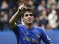 Chelsea midfielder Oscar celebrates a goal against Swansea on April 28, 2013