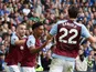 Aston Villa's Ollie Watkins celebrates scoring their first goal with teammates John McGinn and Nicolo Zaniolo on September 24, 2023