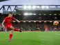 Liverpool midfielder Philippe Coutinho crosses the ball during his side's Premier League clash with Watford at Anfield on November 6, 2016