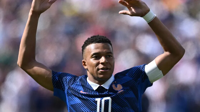 Mbappe overcomes penalty controversy to claim Giroud goalscoring record