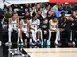 San Antonio Spurs players on the bench