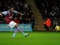 Villa striker Christian Benteke scores a penalty against Swansea on January 1, 2013