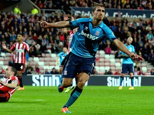 Hughes hails match winner Muniesa