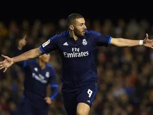 Late Benzema strike preserves Real run