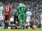 Junior Stanislas of Bournemouth goes off injured during the Premier League match against Manchester City on December 23, 2017