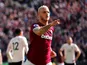 West Ham's Marko Arnautovic wheels away in celebration after scoring during his side's Premier League clash with Manchester United on September 29, 2018