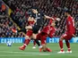 Edinson Cavani and Virgil van Dijk in action during the Champions League group game between Liverpool and Paris Saint-Germain on September 18, 2018