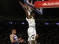Denver Nuggets guard Will Barton (5) slam dunks the ball over New York Knicks forward Kevin Knox II (20) during the first half at Madison Square Garden on December 6, 2019