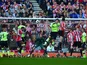 John O'Shea heads toward goal