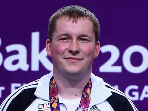 Gold medalist Christian Reitz of Germany poses with the medal won during the Men's Shooting 25m Rapid Fire Pistol on day nine of the Baku 2015 European Games at the Baku Shooting Centre on June 21, 2015