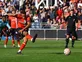 Luton claim first Premier League point against 10-man Wolves