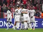 Real Madrid's players celebrate a goal.