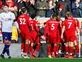 Liverpool cruise past Bournemouth to regain top spot