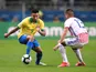 Brazil's Gabriel Jesus in action with Paraguay's Junior Alonso in the quarter-finals of the Copa America on June 27, 2019