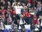 Mousa Dembele celebrates scoring during the Premier League game between Tottenham Hotspur and Bournemouth on April 15, 2017