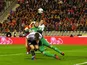 Allan McGregor makes a save for Scotland