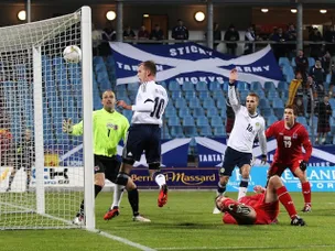 Rhodes bags brace for Scots