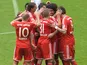 Bayern players celebrate scoring against Augsburg on May 11, 2013