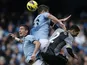 Clint Dempsey, Matija Nastasic and Aleksander Kolarov all jump for the ball