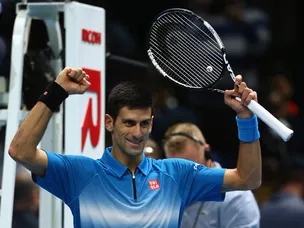 Djokovic cruises through Finals opener