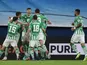 Real Betis' Guido Rodriguez celebrates scoring their first goal with teammates on February 17, 2022