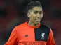 Roberto Firmino warms up ahead of the Premier League game between Liverpool and Manchester City on December 31, 2016