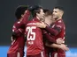 Bayern Munich's Thomas Muller celebrates scoring their second goal with teammates on January 23, 2022