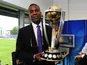 Former West Indian Cricketer, Michael Holding poses with the ICC Cricket World Cup Trophy during the England v India One Day International at The County Ground on August 25, 2014