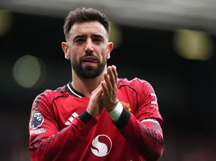 Fernandes makes club history despite still trailing Henry after Liverpool win