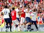 Tottenham Hotspur's Harry Winks and Arsenal's Sokratis Papastathopoulos clash on September 1, 2019