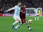 Olympiacos' Kostas Fortounis in action with West Ham United's Said Benrahma on November 9, 2023