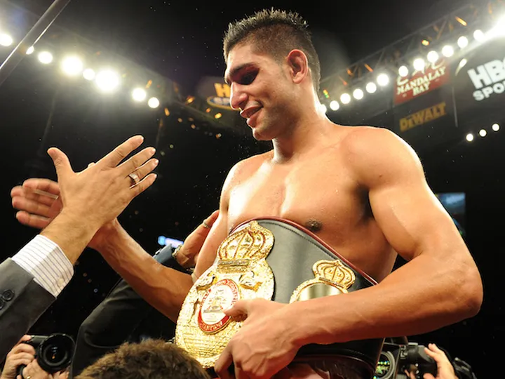 OTD: Khan beats Maidana in fight of the year