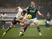 Lorent Tolaj of Plymouth Argyle challenges for the ball with Connor Hall of Port Vale on November 22, 2025