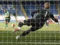 Leicester City's Kasper Schmeichel saves a penalty from Brighton & Hove Albion's Neal Maupay on June 23, 2020