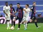 Real Madrid's Luka Modric in action with Barcelona's Sergio Busquets on March 2, 2023