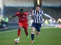 Leicester City's Ahmed Musa and Millwall's Calum Butcher on February 18, 2017