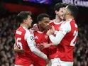 Arsenal's Jurrien Timber celebrates with teammates on November 26, 2025