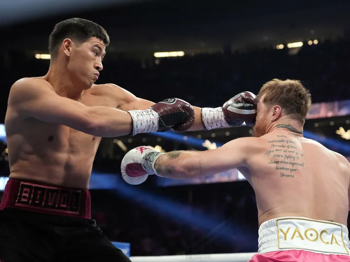 Bivol stuns Canelo to defend light-heavyweight crown