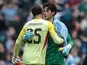 Manchester City's James Trafford embraces Liverpool goalkeeper Giorgi Mamardashvili on April 4, 2026