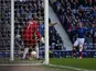 Rangers' Andrew Little slots home his team's opener against Berwick on January 12, 2013