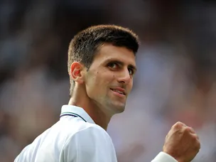 Djokovic edges into semi-finals
