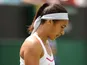 Great Britain's Heather Watson dejected after losing her match against USA's Madison Keys during day two of the Wimbledon Championships on June 25, 2013