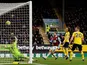 Burnley's Jay Rodriguez shoots against the crossbar as Arsenal's Bernd Leno attempts to save on February 2, 2020