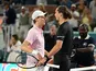Jannik Sinner and Alexander Zverev embrace at the Miami Open on March 27, 2026