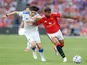 Ao Tanaka of Leeds United and Andrey Santos of Manchester United on August 12, 2026