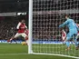 Alexandre Lacazette pulls one back during the Premier League game between Arsenal and Manchester United on December 2, 2017
