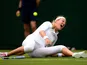 Victoria Azarenka slips during her match against Portugal's Maria Joao Koehler on June 24, 2013