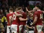 Wales celebrate beating Scotland in the Six Nations on February 12, 2022.