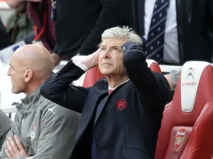 Wenger not worried about empty seats