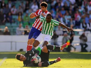 Atletico Madrid go top with Betis win